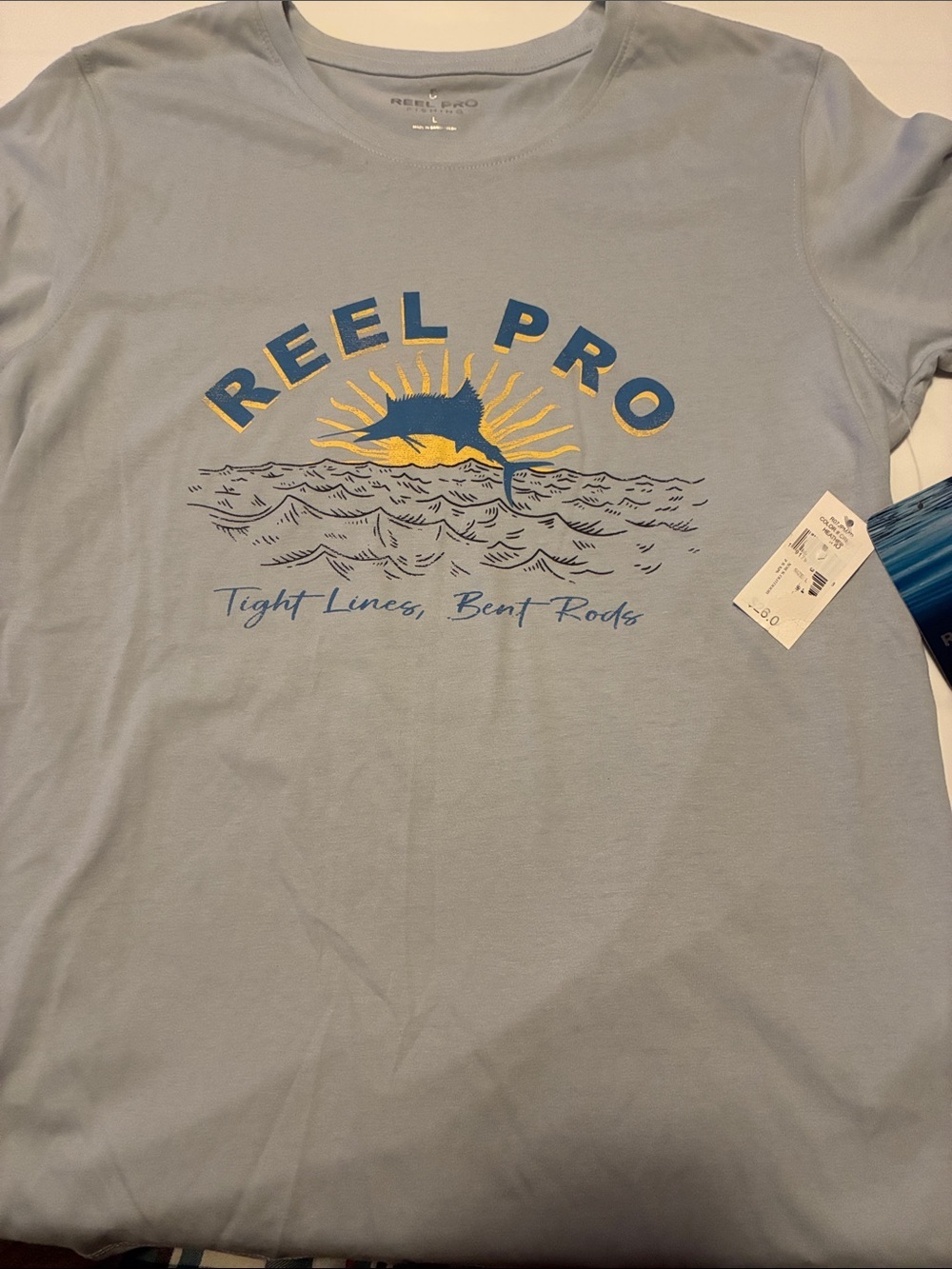 Reel Pro Graphic T-Shirt in Light Blue with Yellow & Navy